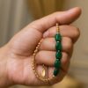 حجر الزمرد الأخضر تصميم 1 حجر الزمرد الأخضر